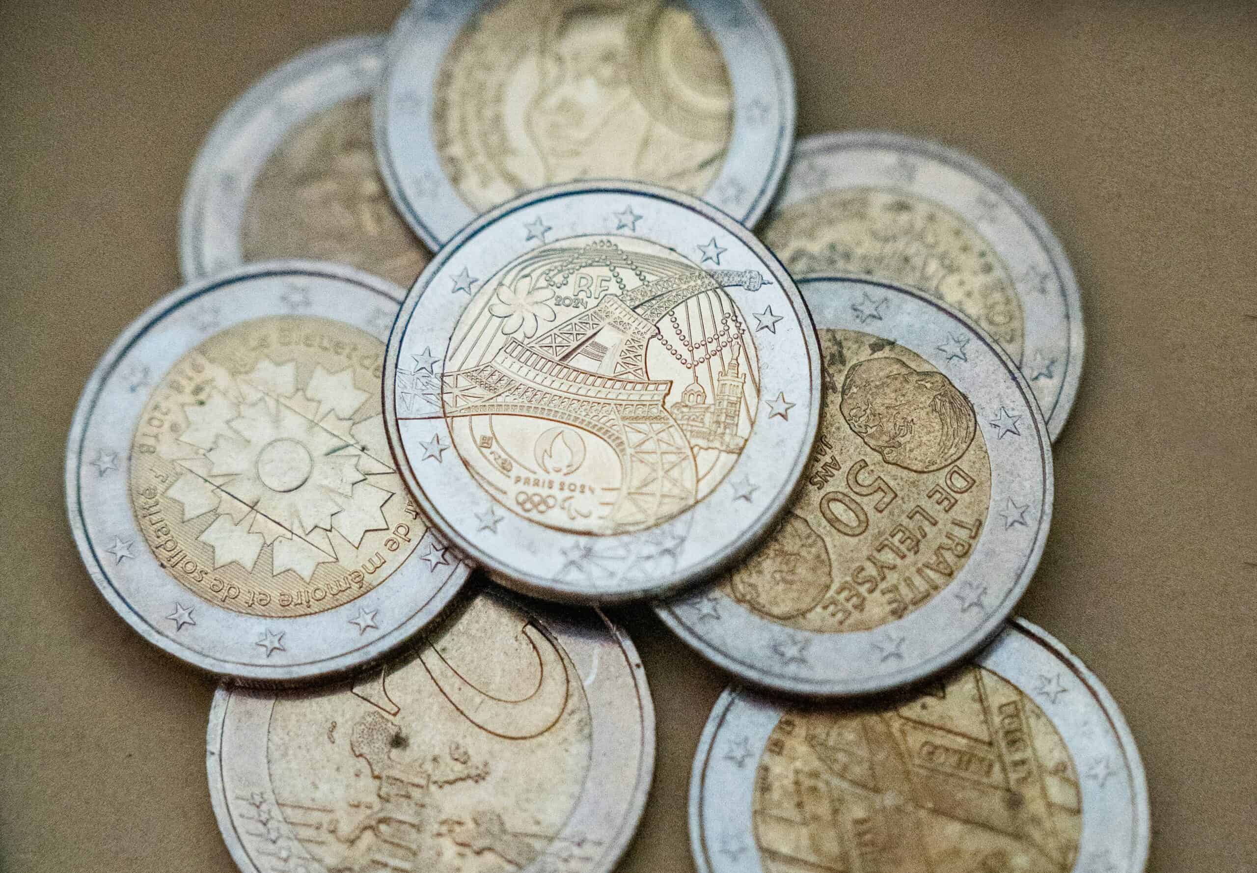Coins with Paris Olympics logos
