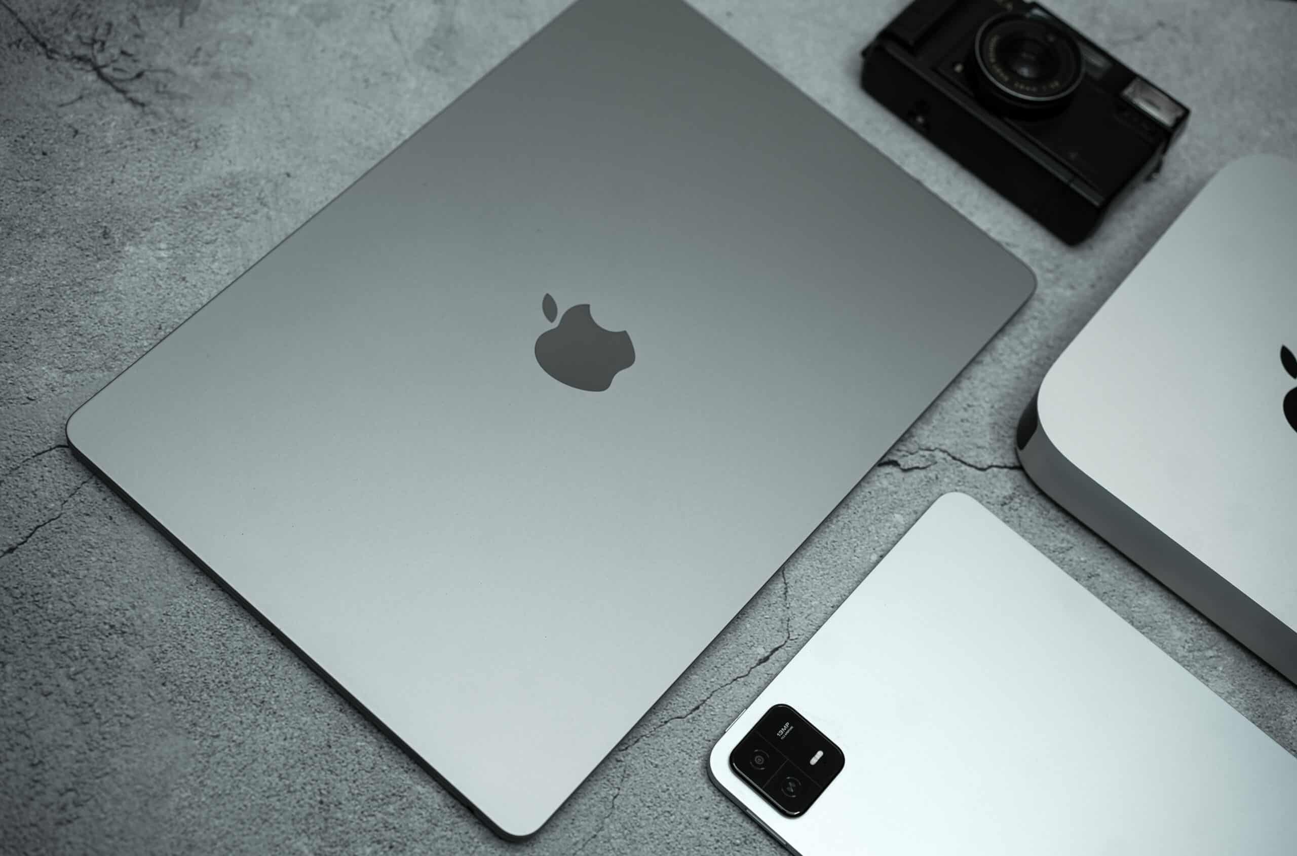 Apple devices on a stone ground