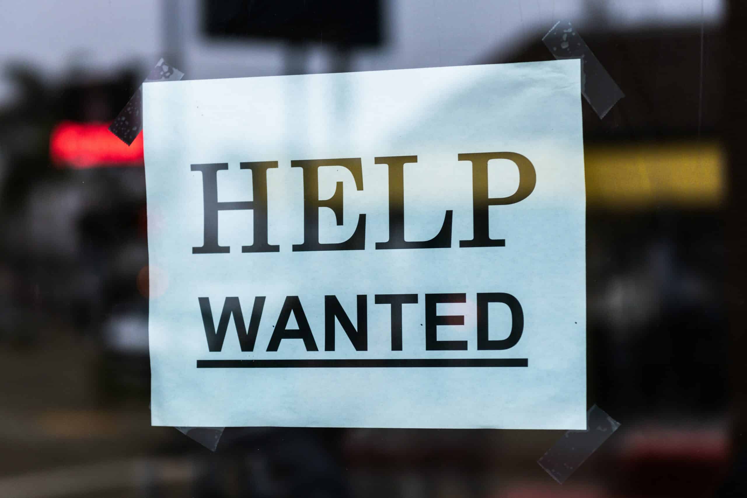 Help wanted sign in window