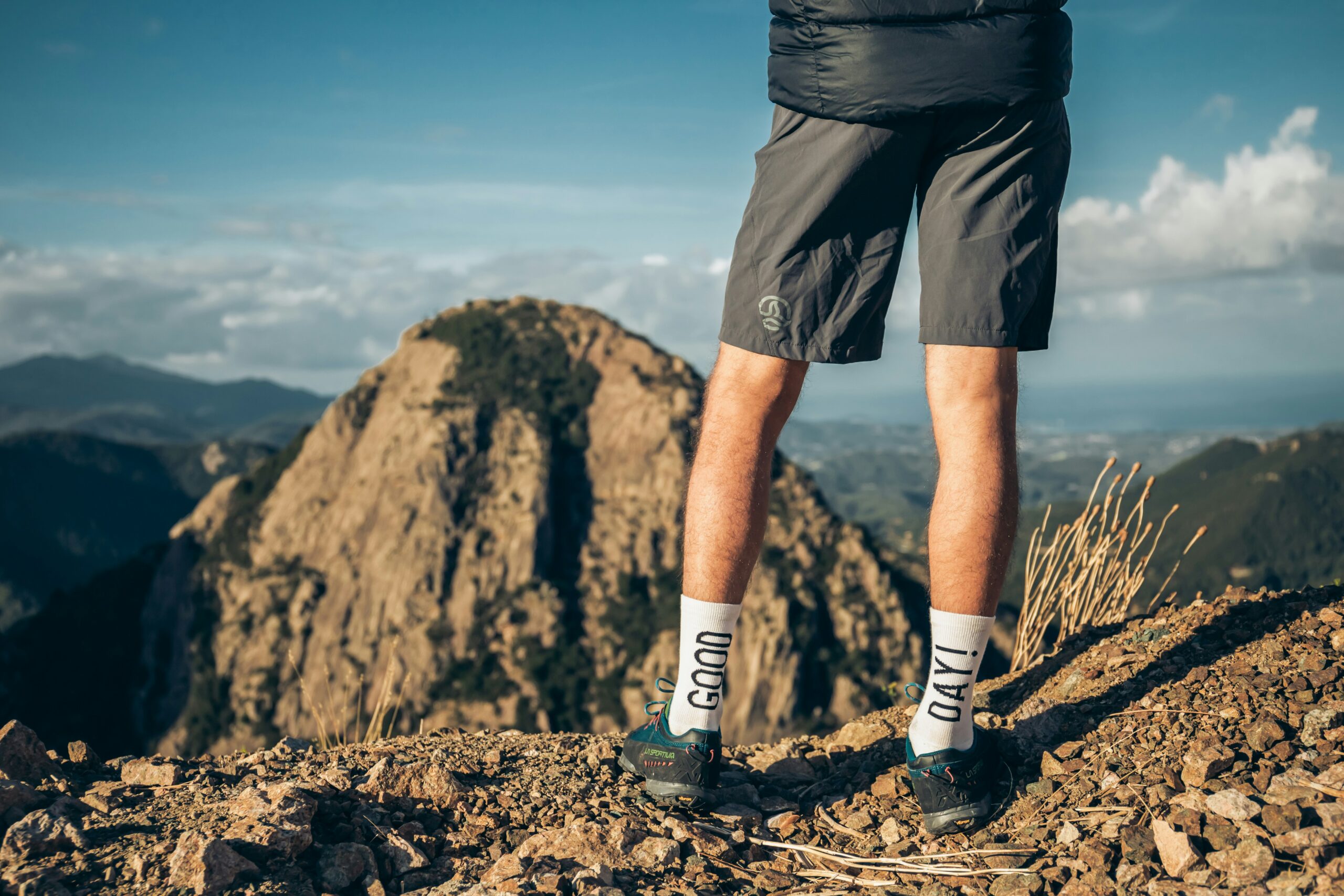 person wearing shorts in mountains